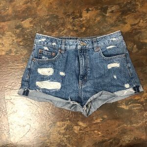 Distressed denim shorts